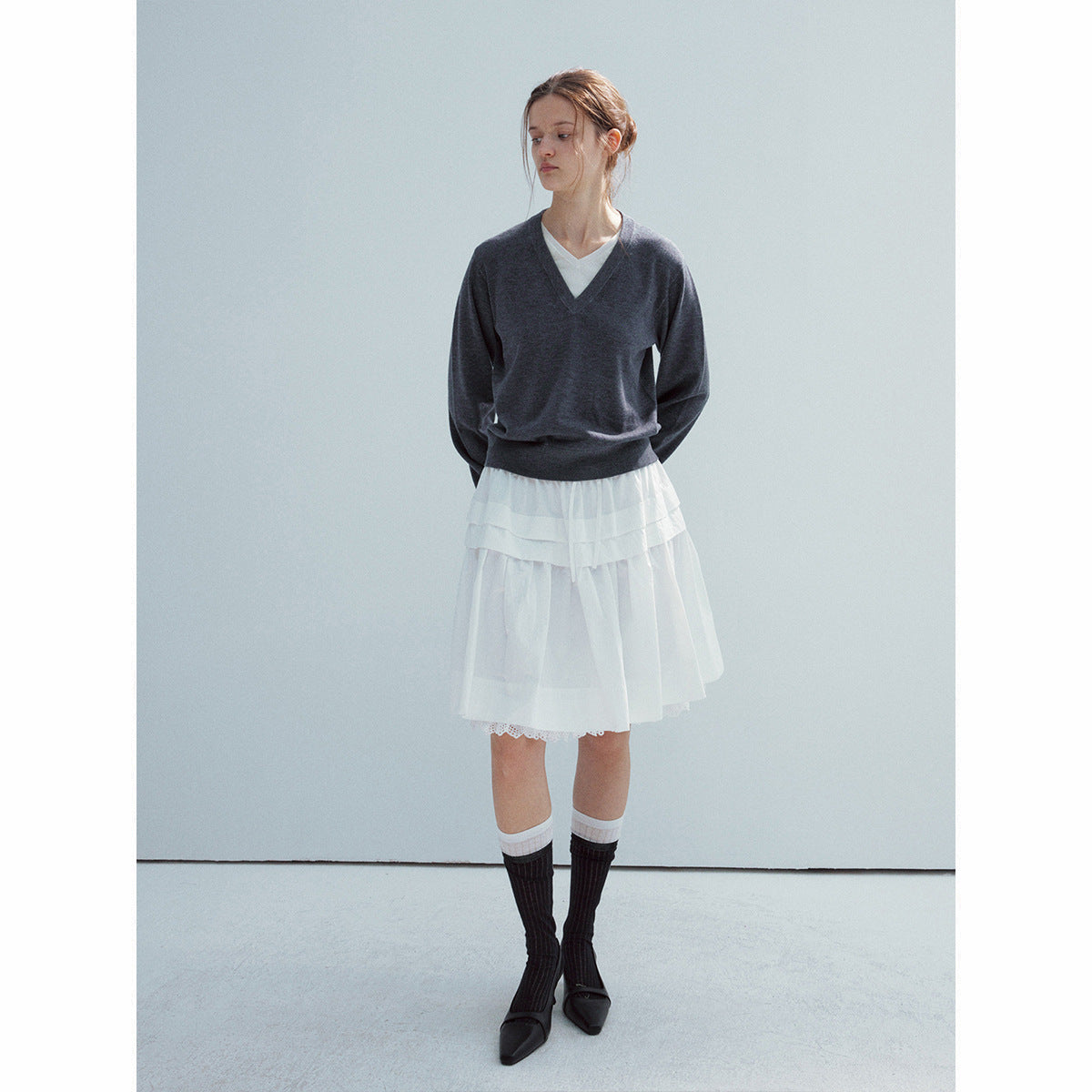 Spring new casual wool fake two-piece pure version solid color V-neck long-sleeved knitted sweater