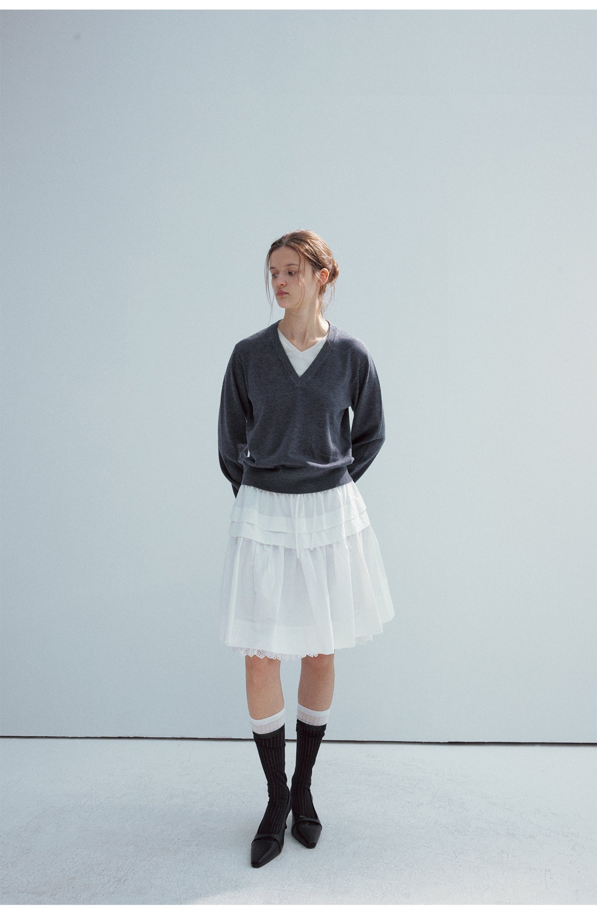 Spring new casual wool fake two-piece pure version solid color V-neck long-sleeved knitted sweater