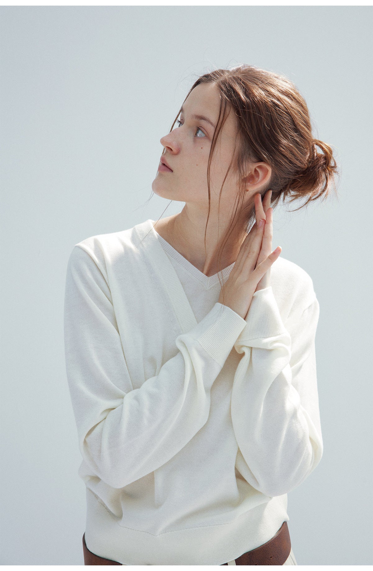 Spring new casual wool fake two-piece pure version solid color V-neck long-sleeved knitted sweater